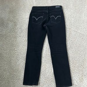 Black Levi’s jeans with nice stitching